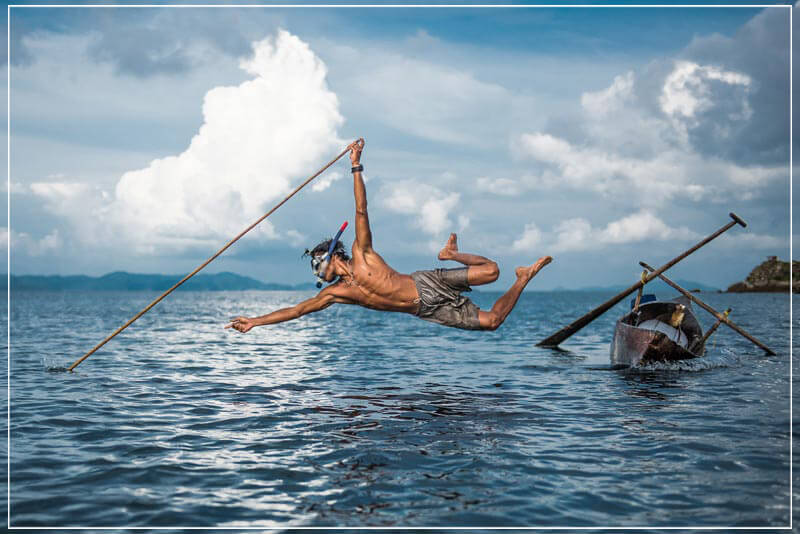 "Disappearing fishing method by Moken" by Dorte Verner Photography-Artography Limited