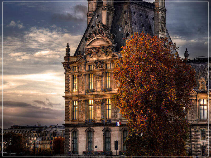 "Sunset on The Louvre Paris 2015" by Christopher Petsos Photography-Artography Limited