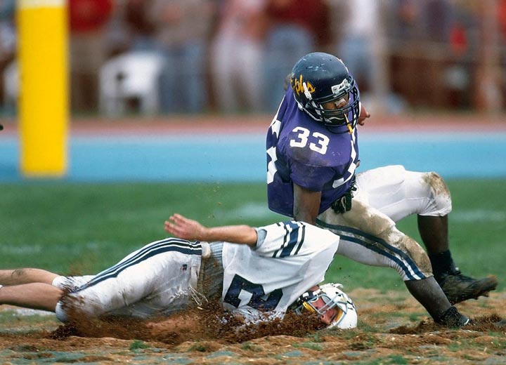 "Football in the Mud" by Chuck Solomon Photography