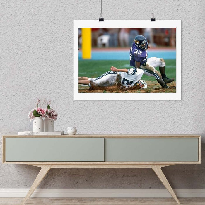 "Football in the Mud" by Chuck Solomon Photography-Artography Limited