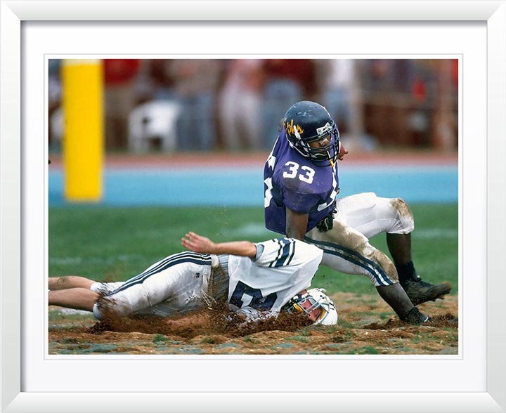 "Football in the Mud" by Chuck Solomon Photography