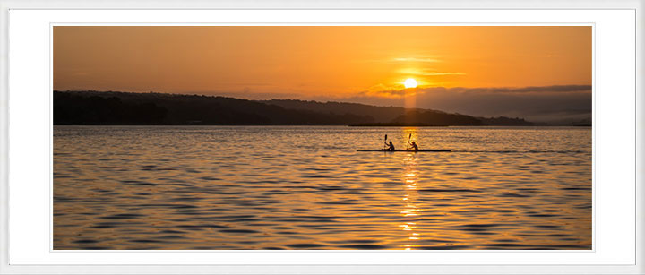 "Rowing in the Sun Rise" by Dorte Verner Photography