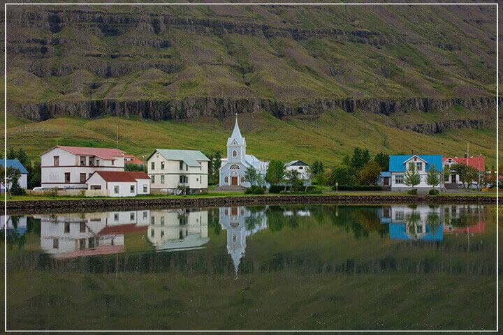 "East Fjord Town, Iceland" by Tom Artin Photography-Artography Limited
